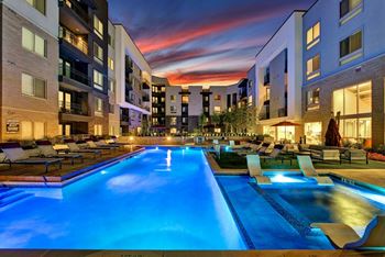 Sparkling Swimming Pool at Night at Berkshire Auburn, Texas, 75248